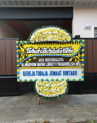 Papan Bunga Duka di Pakujaya